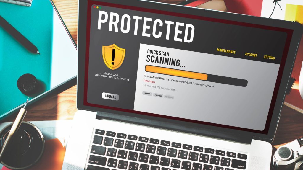 image of a laptop having Comprehensive scan of their entire database
