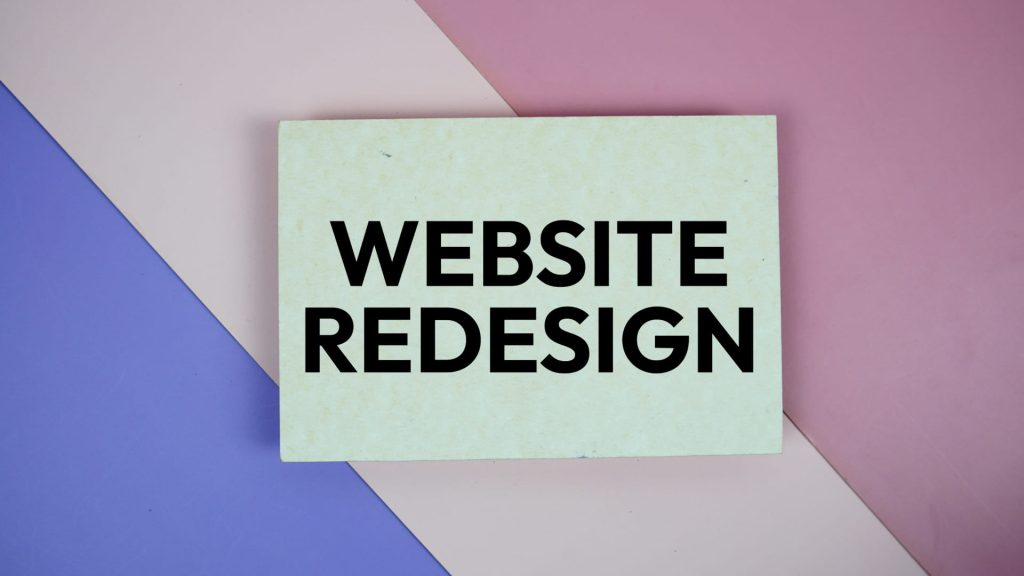A clip art of the word website redesign